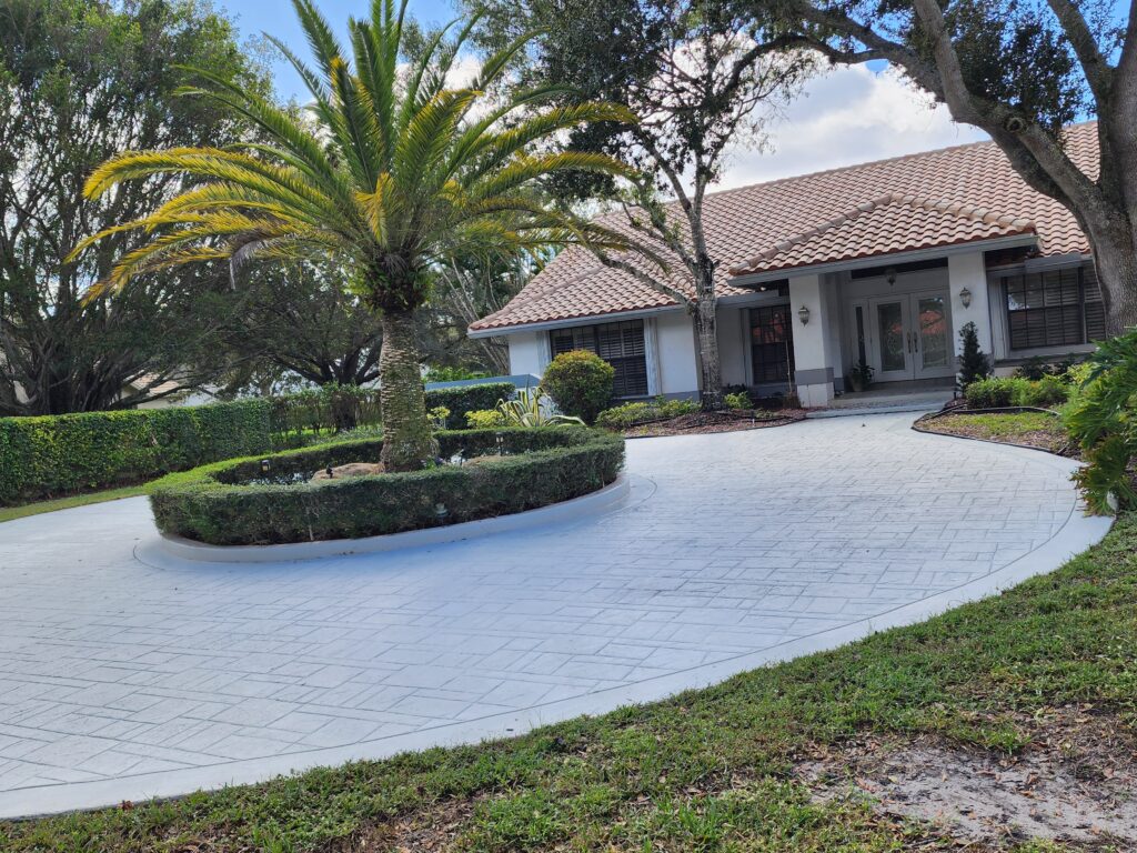 Roof restored from mold, algae, and heavy stains in Boca Raton after professional cleaning by Excelsior Power Cleaning, revealing a clean and uniform surface.