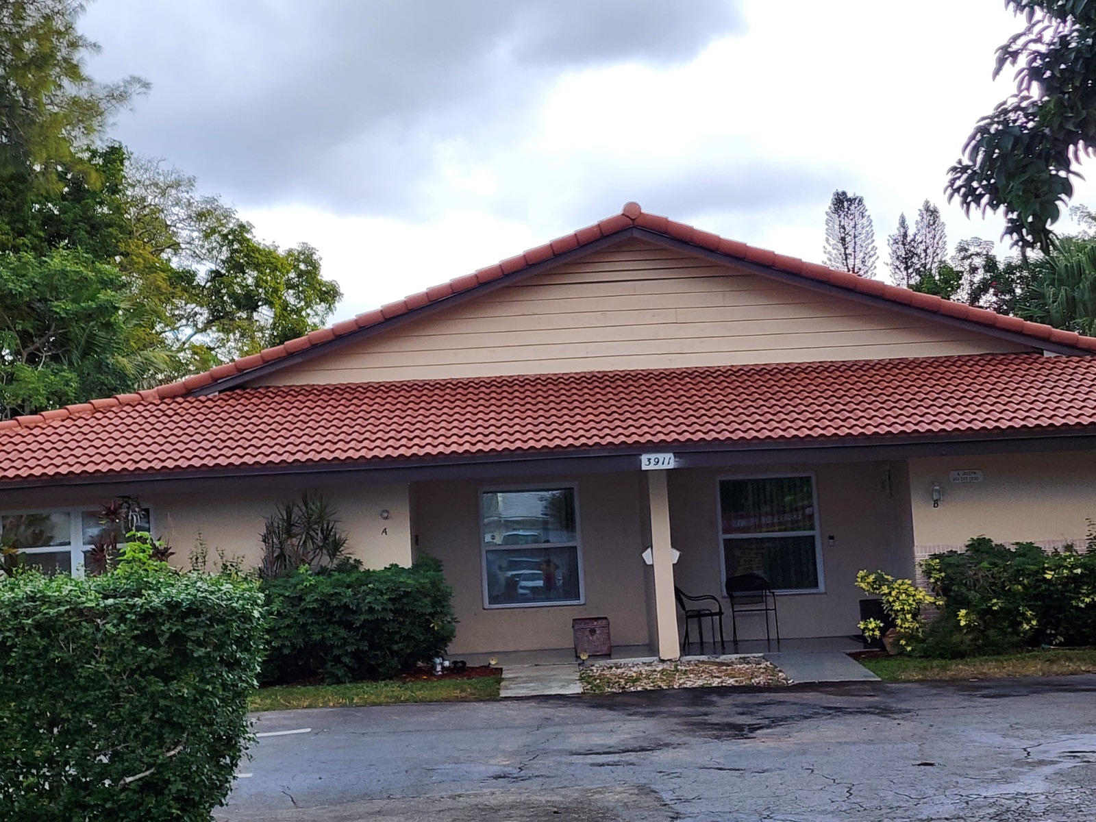 Roof after professional cleaning at Weston Hills Country Club with mold and algae fully removed