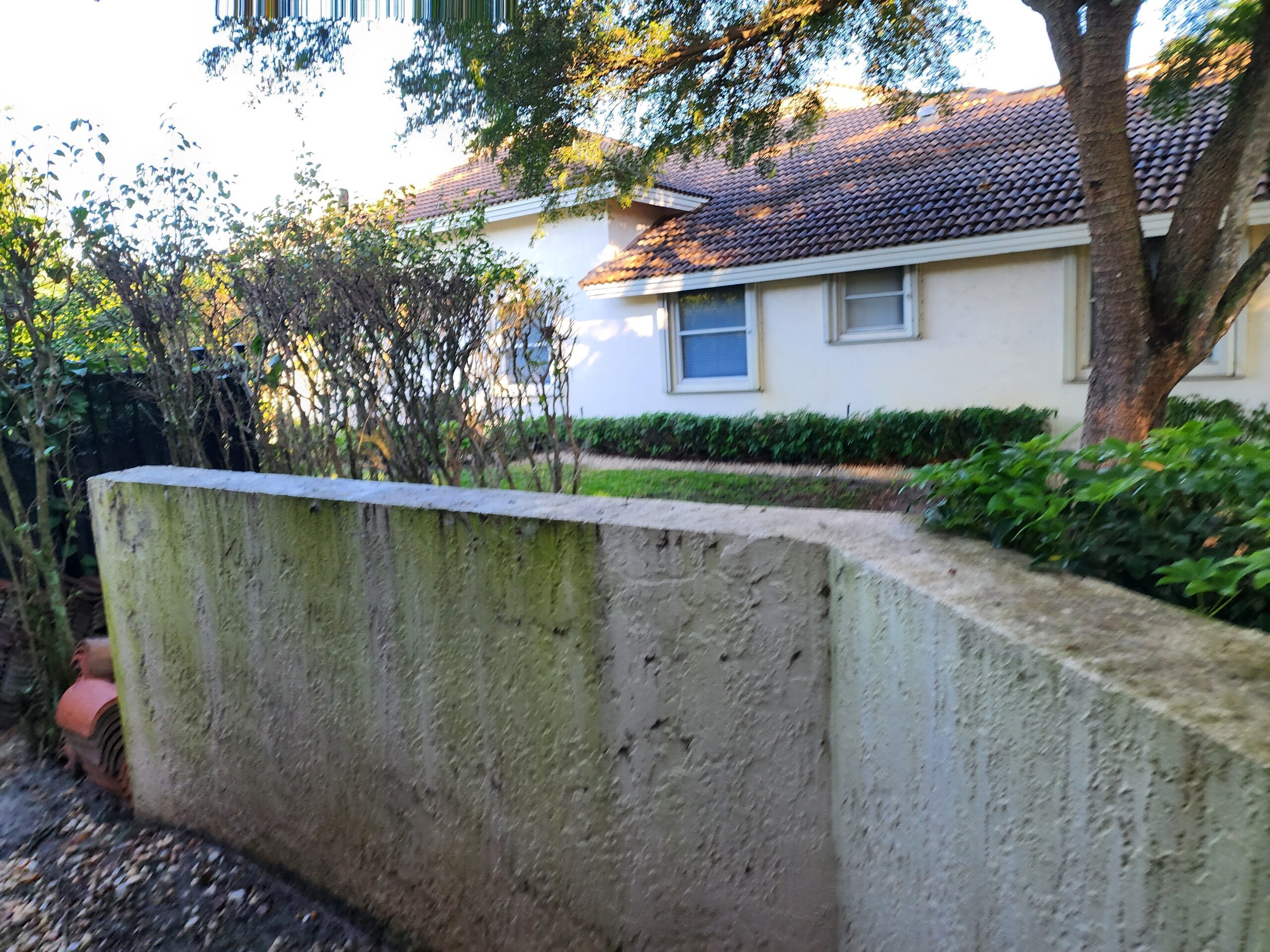Fence power cleaning in Boca Raton by Excelsior before professional surface restoration