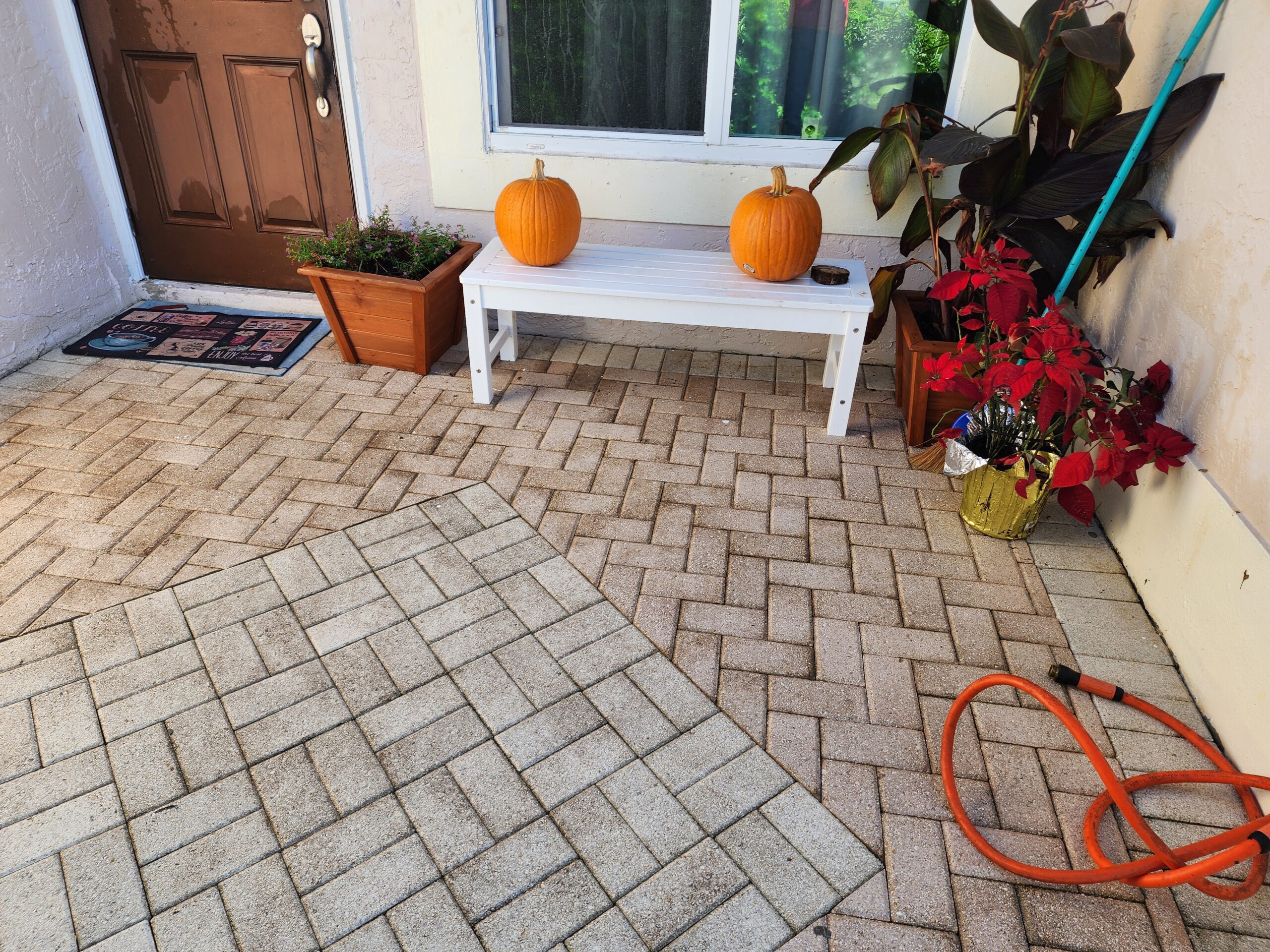 Patio pressure washing in Boca Raton by Excelsior after professional surface restoration