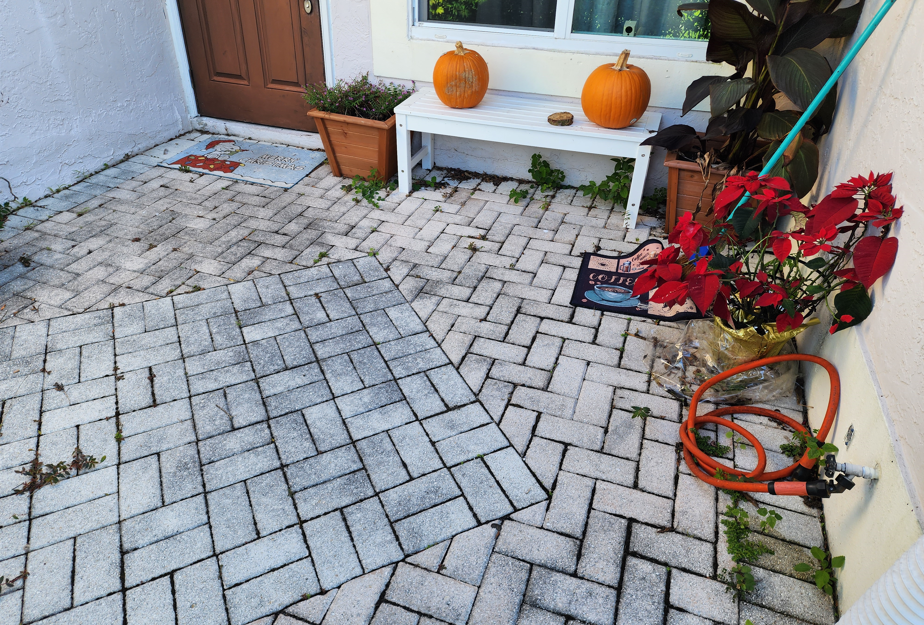 Patio pressure washing in Boca Raton by Excelsior before professional surface restoration