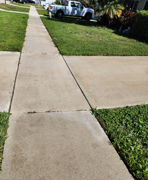 After Sidewalk power cleaning in Boca Raton with a clean, bright surface and all algae and stains fully removed.